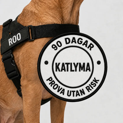 Hund som bär Katlymas svarta antidragsele, med 90 dagars riskfri provperiod